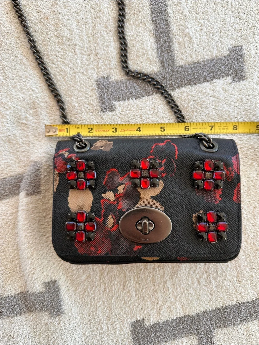 Coach Black Floral Mini Crossbody with Red Jewel Accents